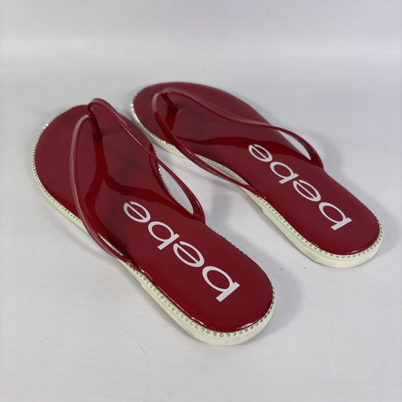 Bebe Ileana Red Patento Womens Size 7.5m Dark Red Flat Slip On Flop Style Slides